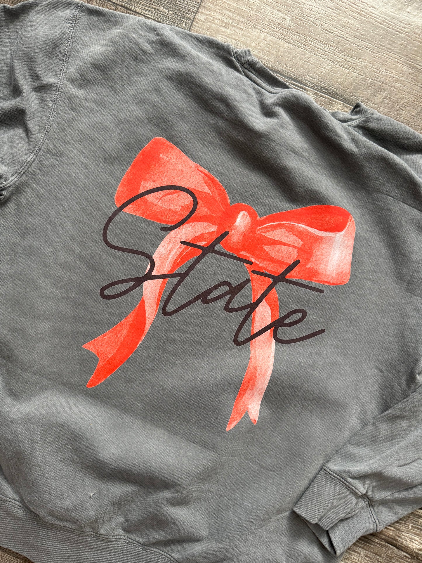 O state bow on front Tshirt or sweatshirt